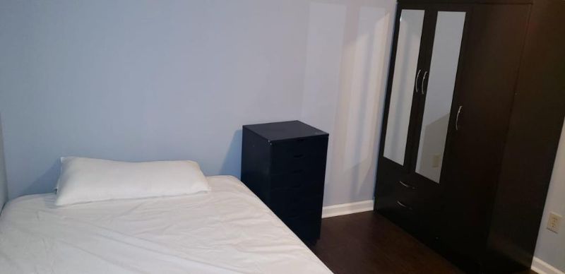 Bed and wardrobe